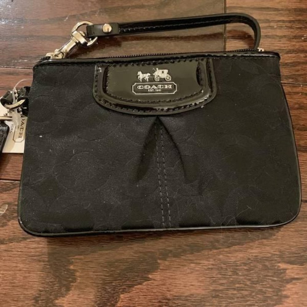 Brand new black Coach clutch